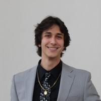 Justin Scola