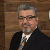 Carlos E. Martinez