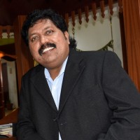 Dr SAJI DSOUZA