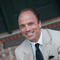 Tim R. Holcomb Ph.D.