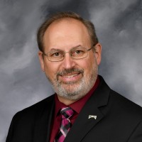 Robert L. Johnson, A.A.S., B.A.