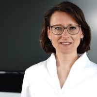 Dr. Christine Merk