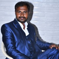 RAJA L