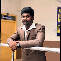 Ashok E