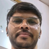 Dinesh M