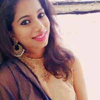 Varsha B