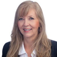 Heidi Larkin-Reed, Iom