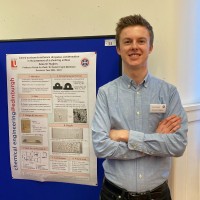John Aneurin (Nye) Hughes, Amicheme