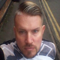Andrew J Wall