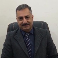 Dr Adel Adnan