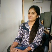 Aruna M