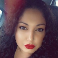 Christina M. Roman