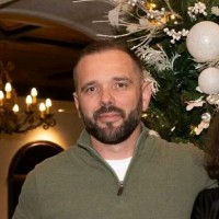 Alan E.
