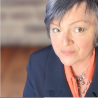 Joan Tigert (she/her)