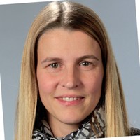 Dr. Christine Loscher