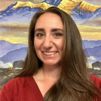 Carolyn Gombotz, Rac