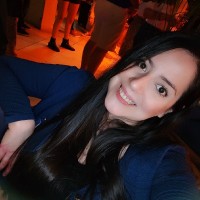 Laura E.