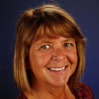 Kristy Tripp, Cap-Om