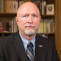 Dr. Mark D. Woodhull PhD, MSA, MSITM, FDCIB, BSBA, AAS
