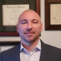 Brent Holman, Dbia