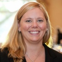 Kristin Di Lullo, Iom