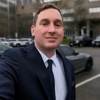 Andrew Debona, Mba