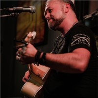 Adam J Ouellette