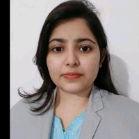 Nazma K.
