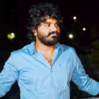 Prasad B