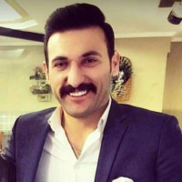 Ali K.