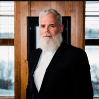 Eric W. Phelps, M.A., J.D.