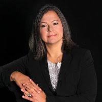 Martha L King