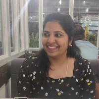 Nisha R