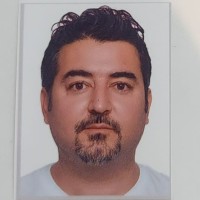 ERKAN T. BAL