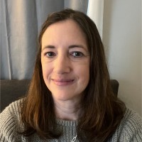 Christina Herkoperec, Ains