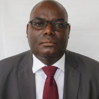 Dr. Heggie Kalangwa Mba, Ba, Fcips, Fzips