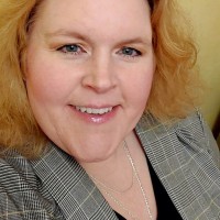 Cat Cook She/Her/Hers