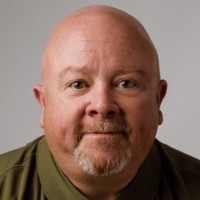 Brian J Koett