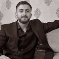 Ali H.