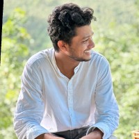 Adhil K
