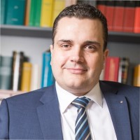 Dr. Martin E. Looser