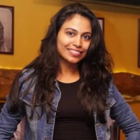 Nidhi M