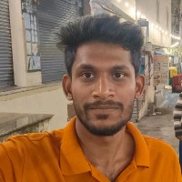 Dinesh M