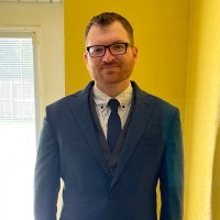 Christopher E.
