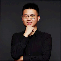 TOM HUANG