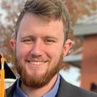 Austin Burgess, Mpa