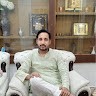 M. AMAN