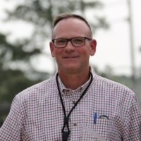 GEORGE E. PALAIMA