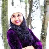 Mouna J C