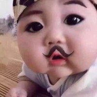 梁天成